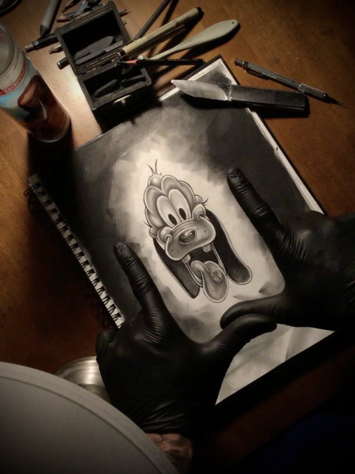 Original artwork photographed on the worktable with gloved hands, the featured piece of the Art collection