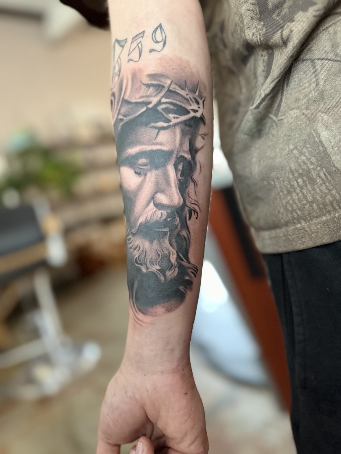 Black and gray tattoo work by Michael