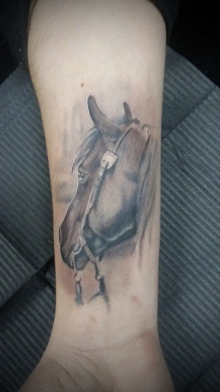 Black and gray tattoo work by Michael