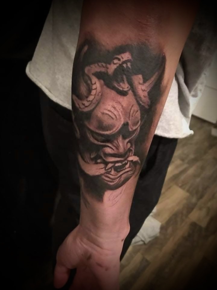 Black and gray tattoo work by Michael