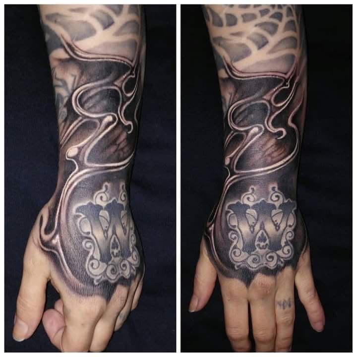 Black and gray tattoo work by Michael