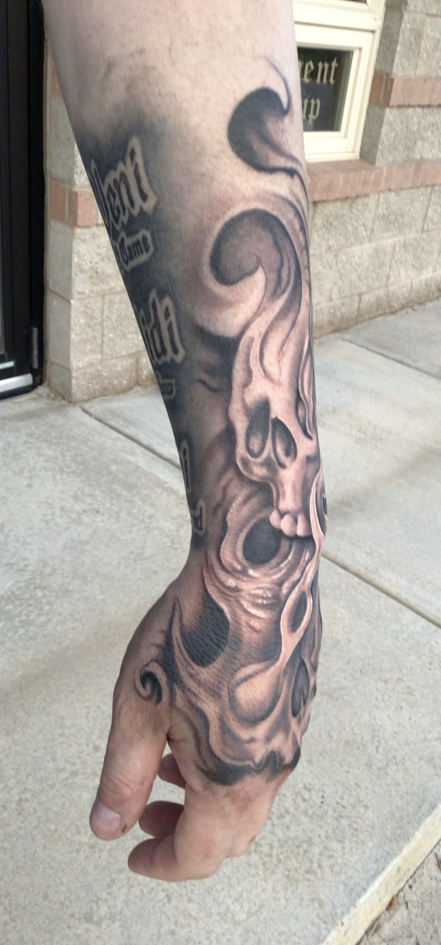 Black and gray tattoo work by Michael