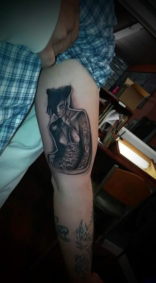 Black and gray tattoo work by Michael