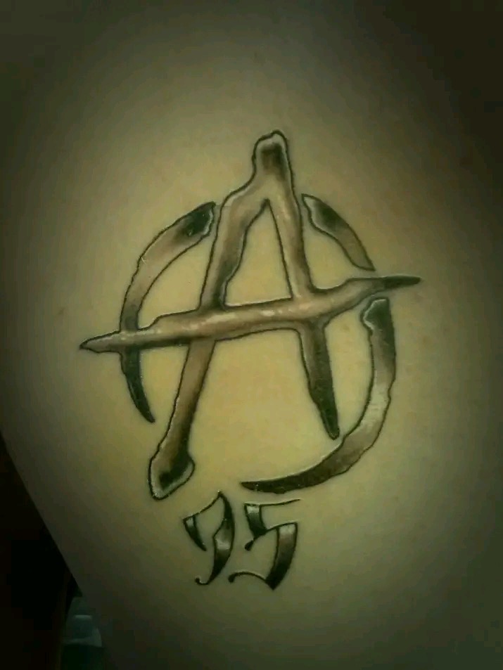 Black and gray tattoo work by Michael