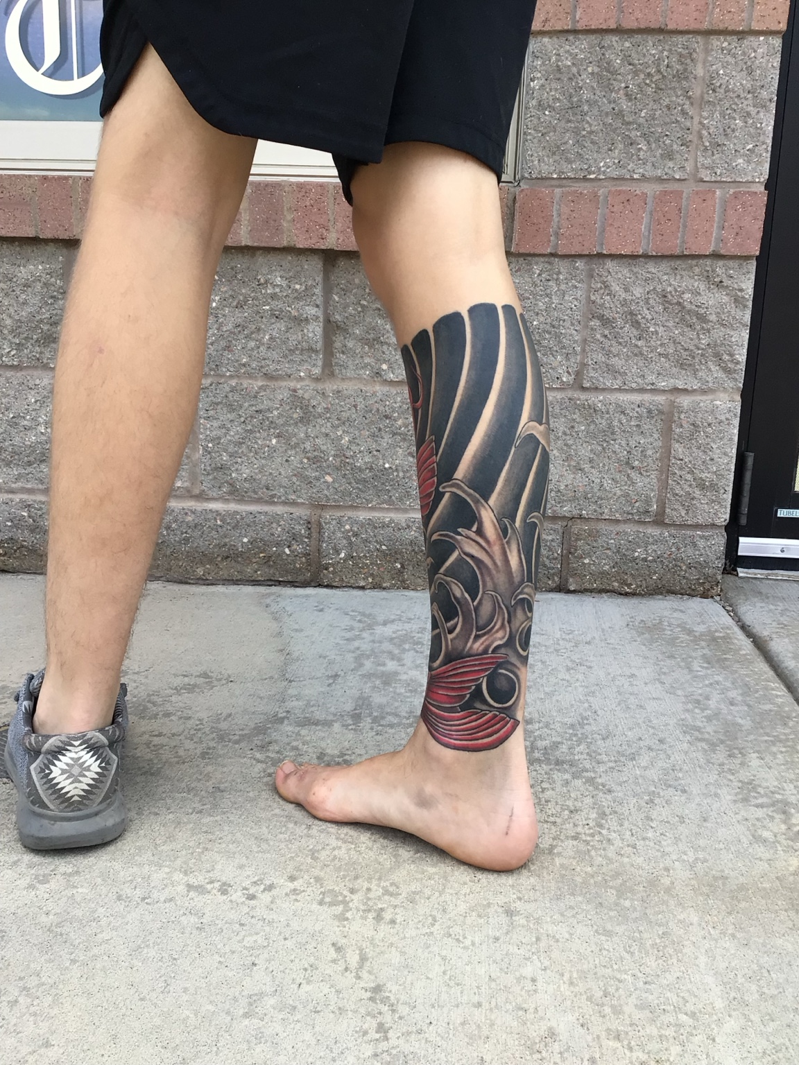 Black and gray tattoo work by Michael